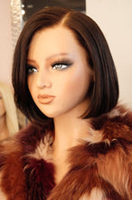 Side view of glueless Kathy Short Wig with styled waves, dark root blonde color, adjustable medium cap from Wigs R Us Toronto